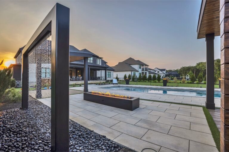 Luxury waterfall pool in Nashville backyard.