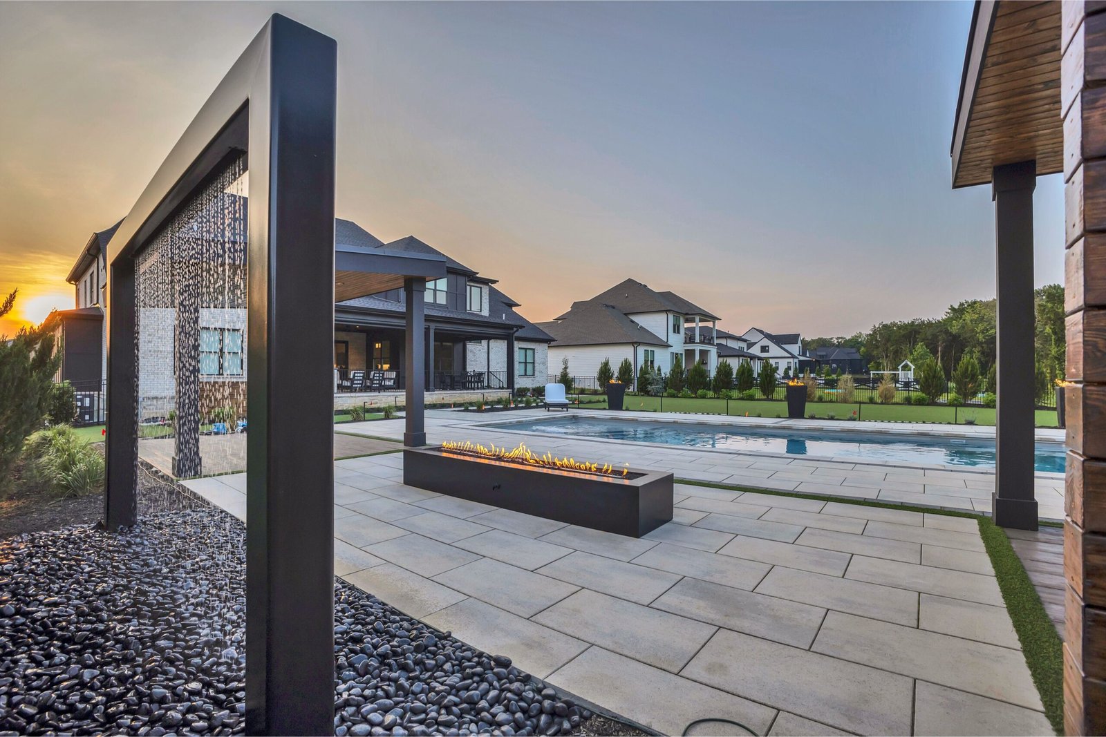 Luxury waterfall pool in Nashville backyard.
