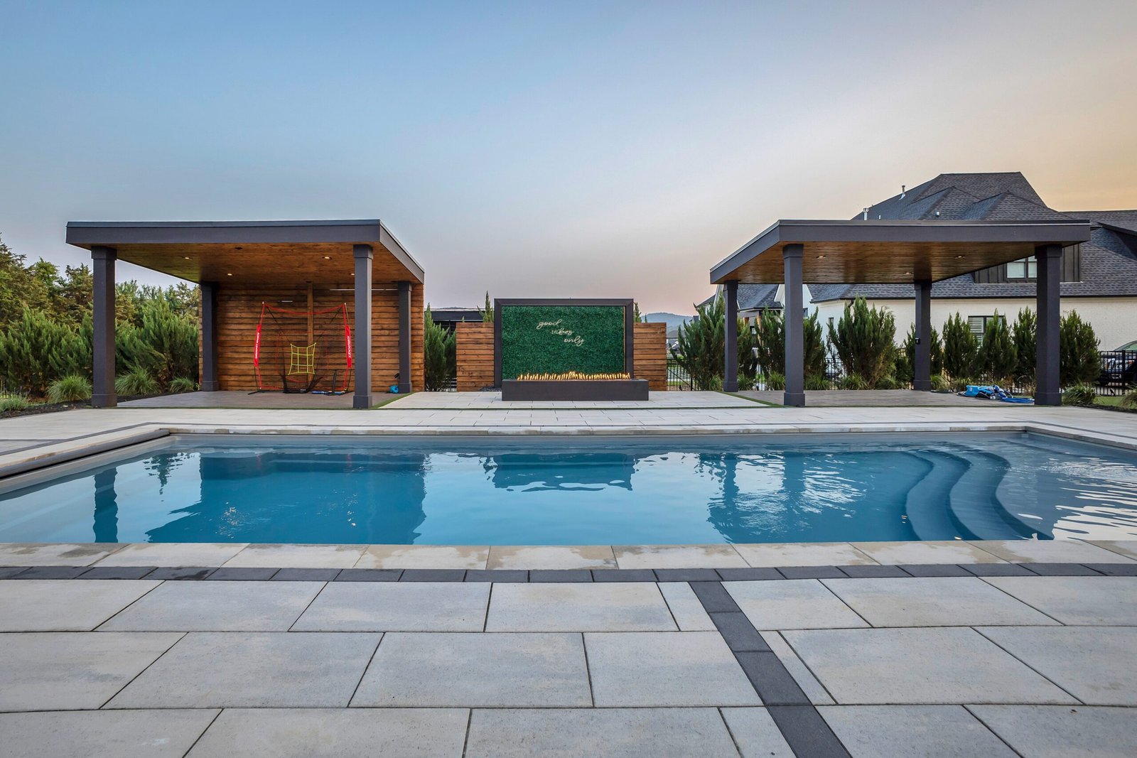 Luxury pool in Nashville with modern design, custom spa, and upscale outdoor living area by Denali Pools & Outdoors.