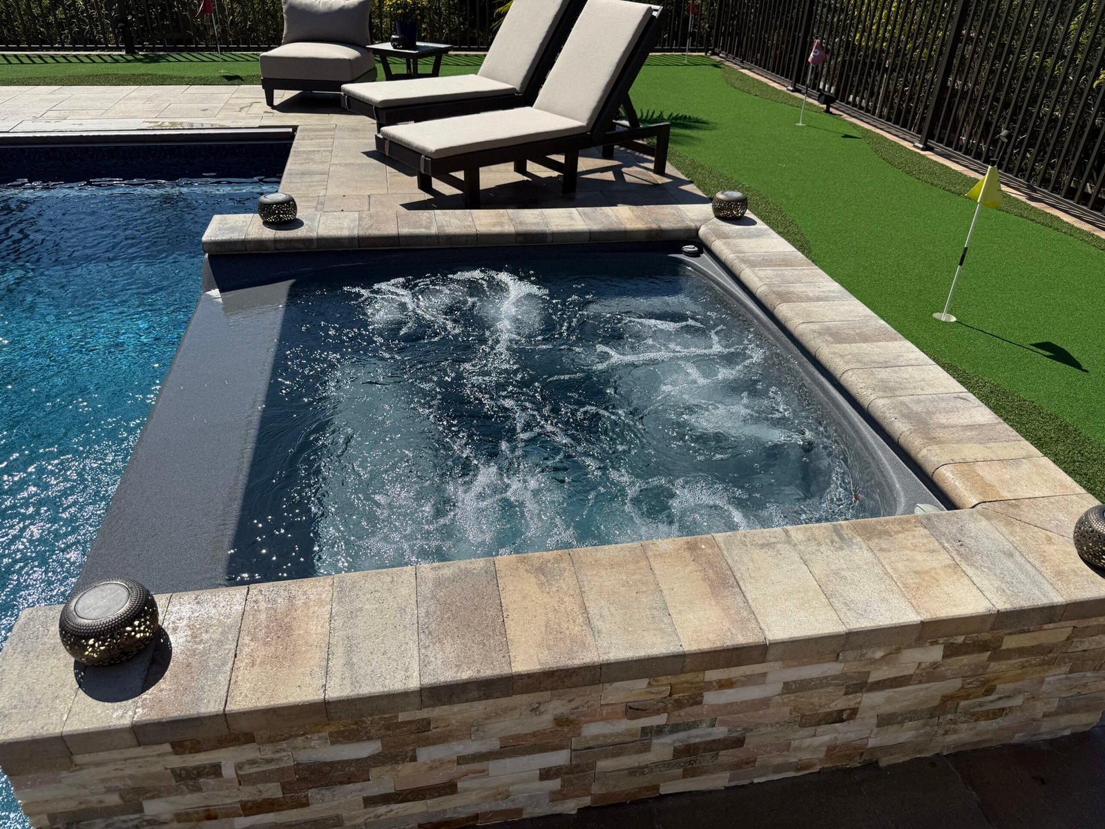Luxury backyard spillover spa