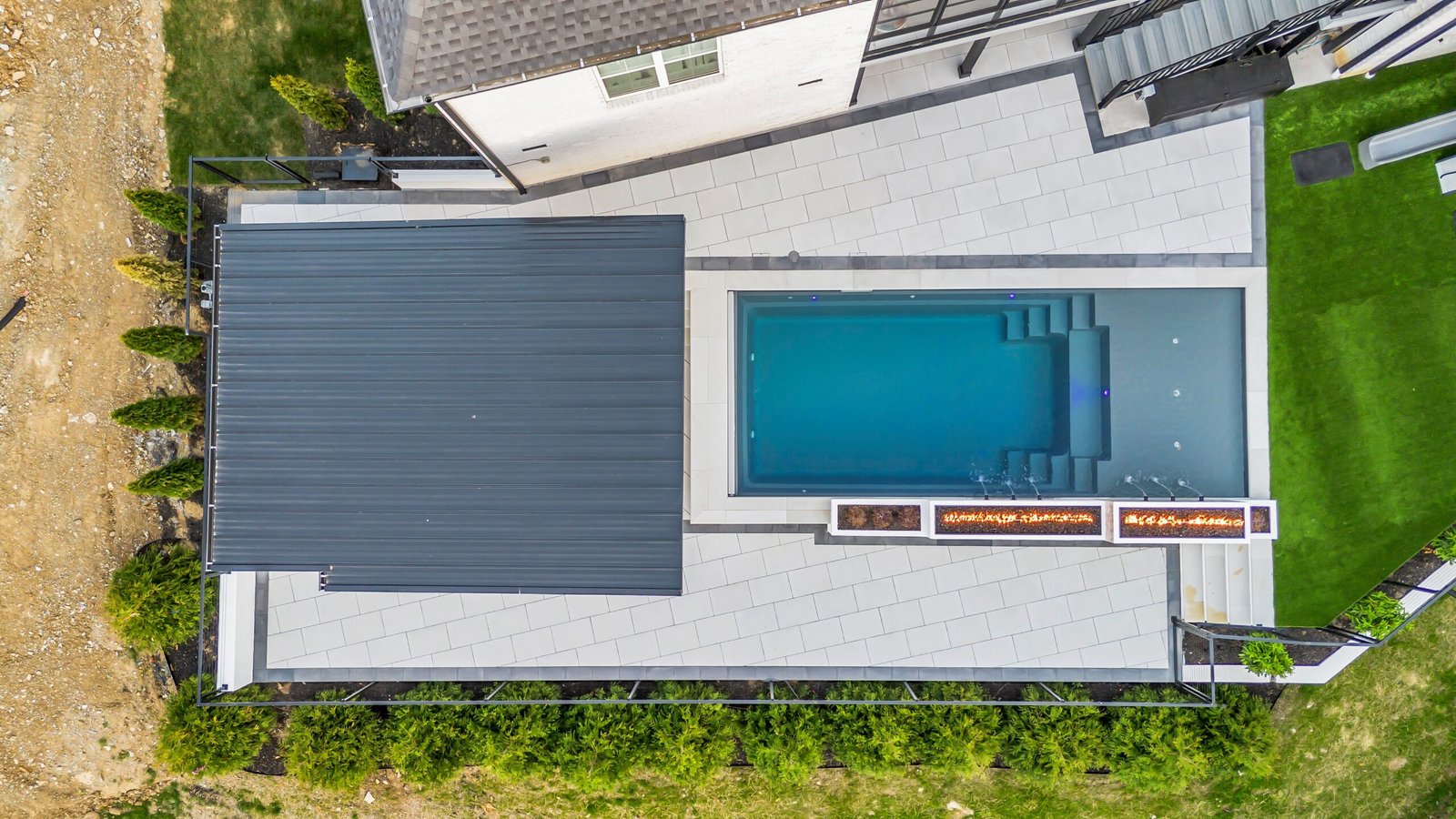 Aerial view of a pool with a fire and water wall